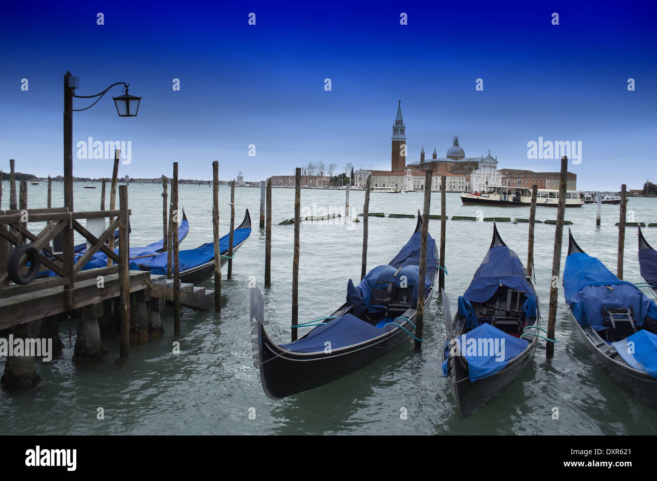 Traditional wooden boat Gondola in Venice close up and detail Stock Photo