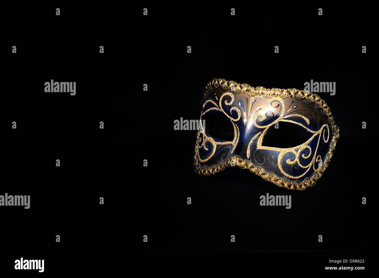 Fancy-dress party mask isolated on black background Stock Photo - Alamy