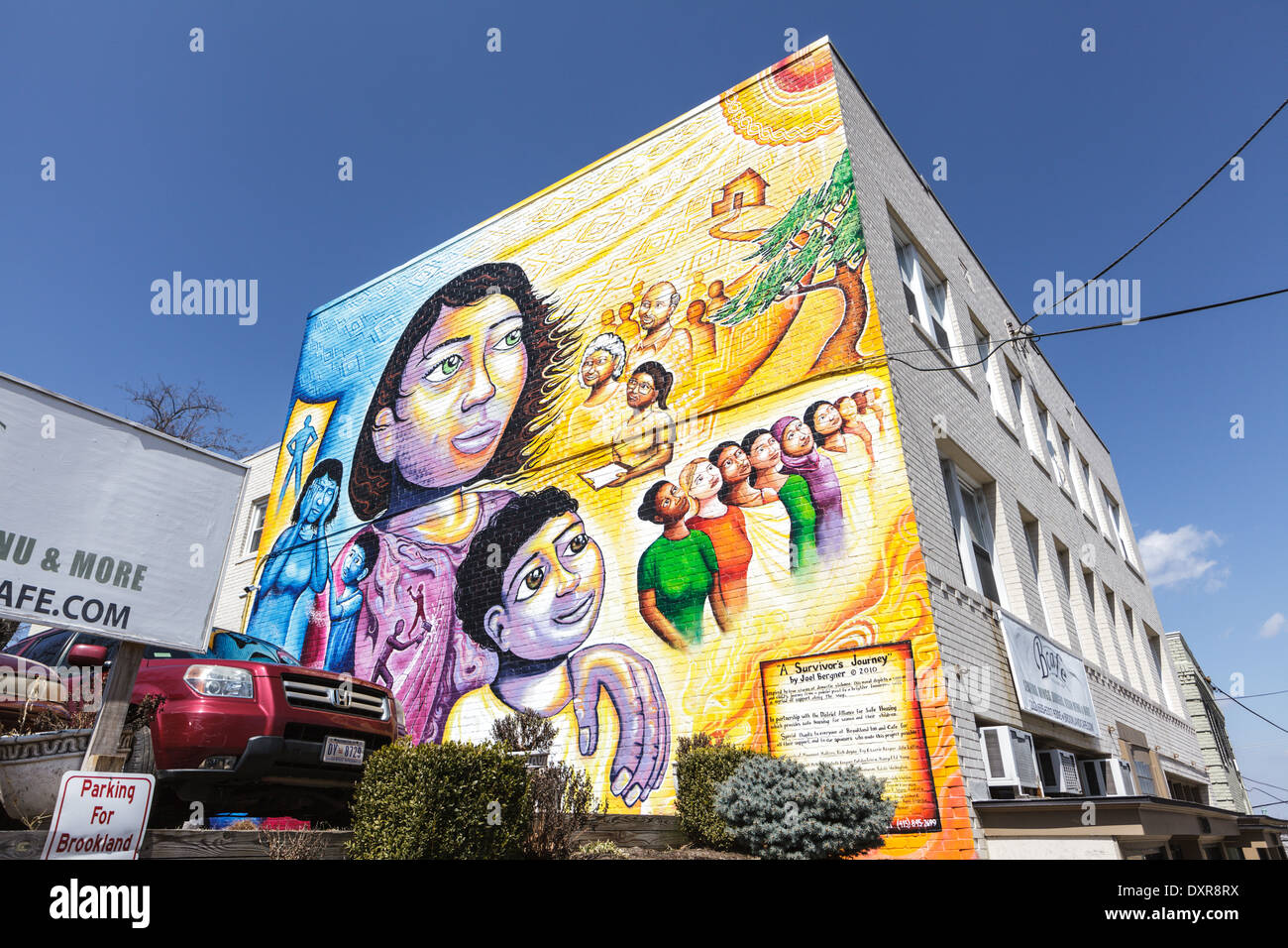 Mural depicts mother and son surviving domestic violence with support ...