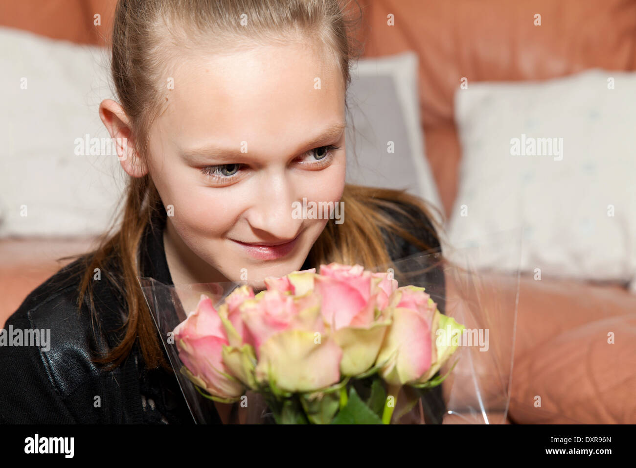 happy girl with a bunch of flowers Stock Photo - Alamy