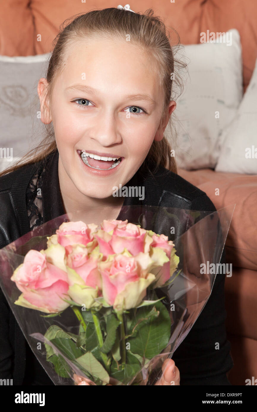 happy girl with a bunch of flowers Stock Photo - Alamy