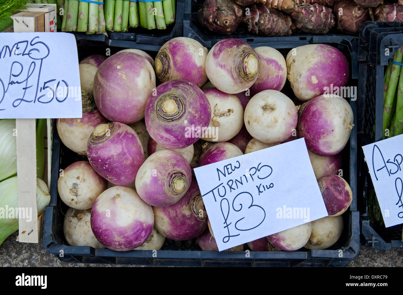 New turnips for sale on an outdoor market stall in the Grassmarket, Edinburgh. Stock Photo