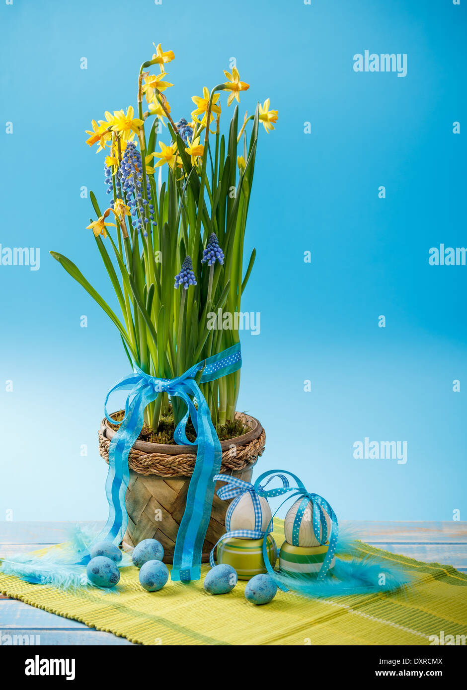 Spring flowers in pots with easter decoration Stock Photo Alamy