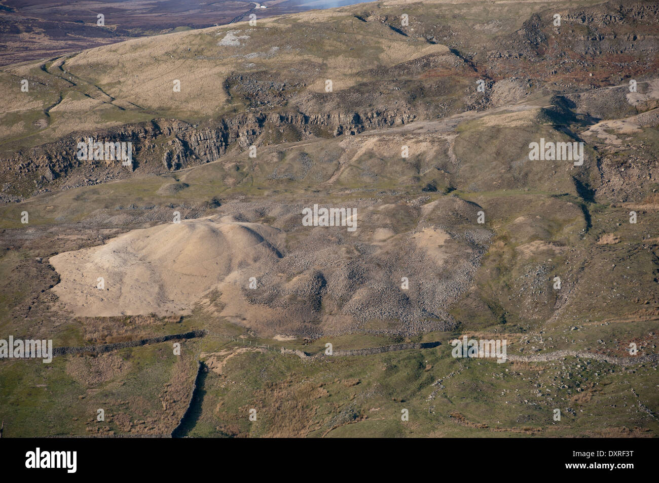 Old mine waste spoil heaps on edge of Arkengarthdale moor, Yorkshire, UK Stock Photo