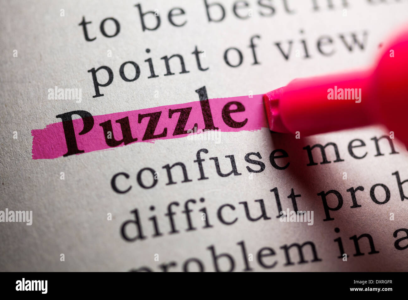 Fake Dictionary, definition of the word puzzle Stock Photo Alamy
