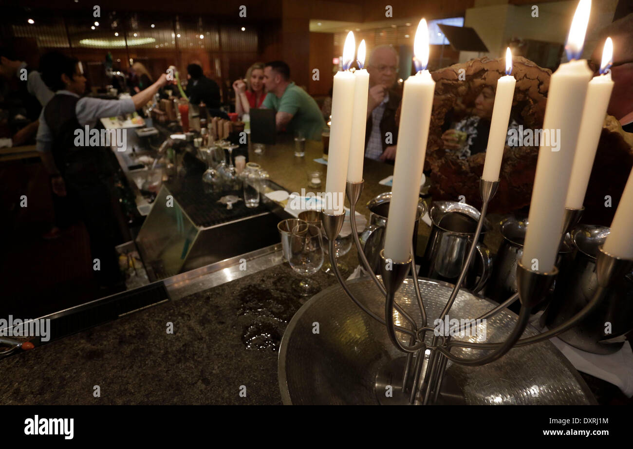 Vancouver, Canada. 29th Mar, 2014. Candles are lighted up as the