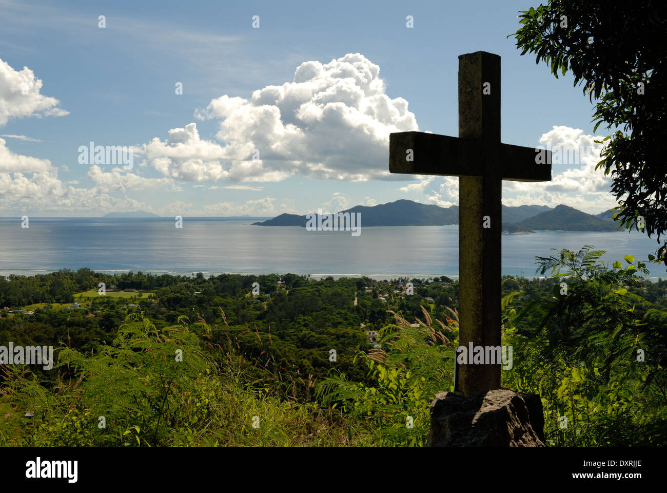 View from Belle Vue with Cross in Foreground and Clouds and Islands in Distance Stock Photo