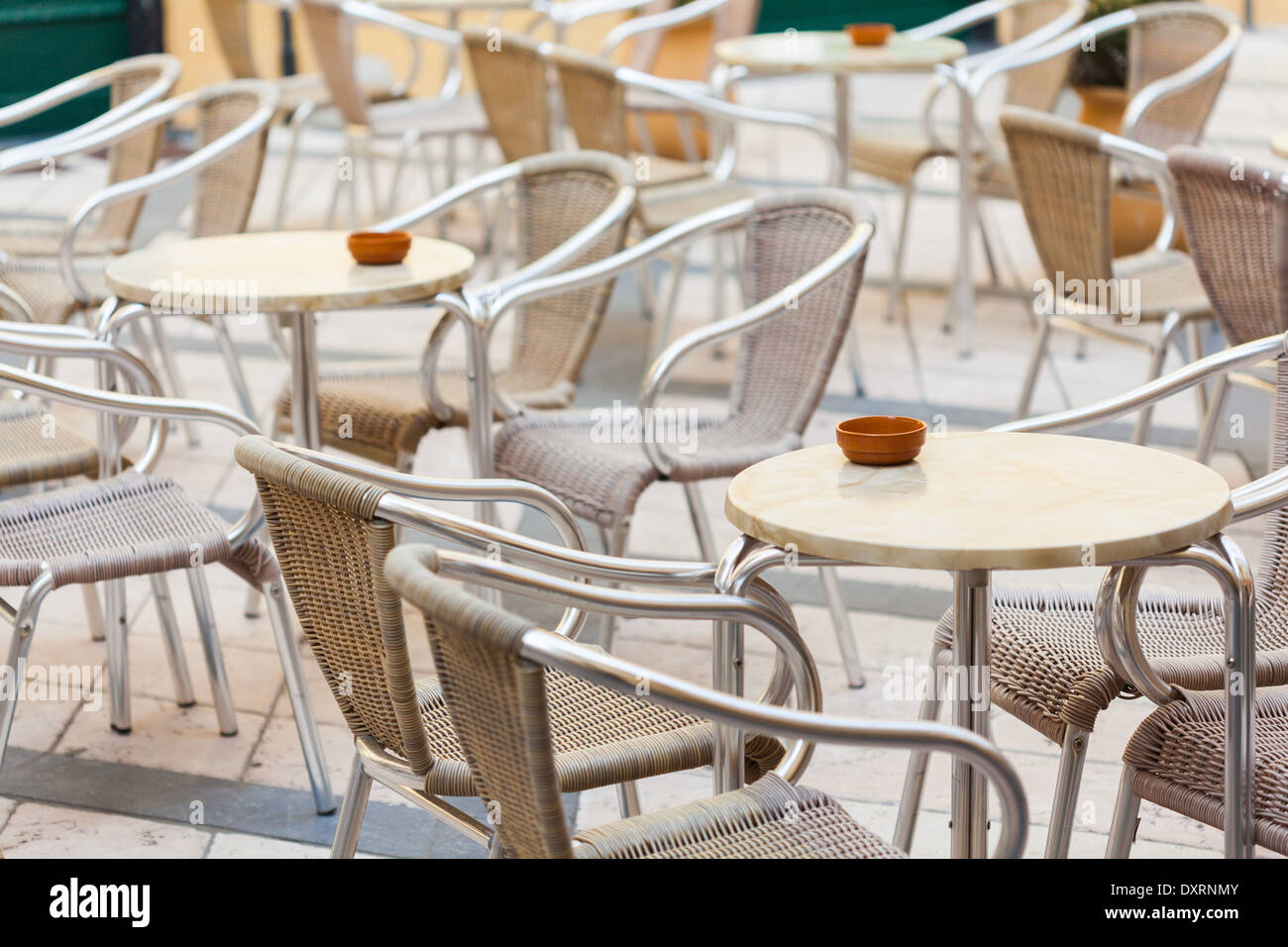Tables and chairs outside bar Stock Photo Alamy