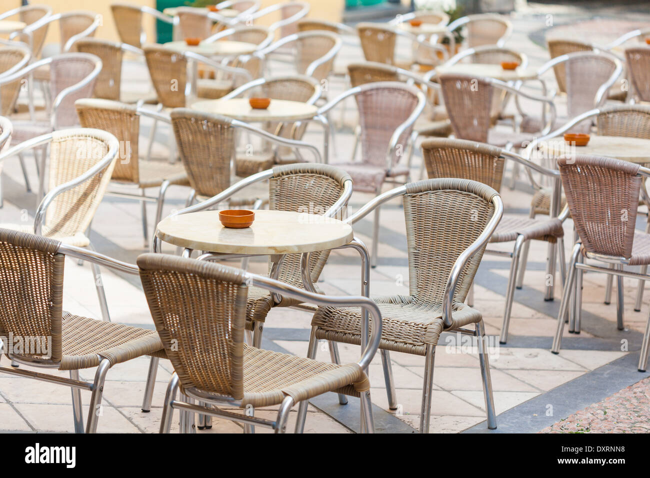 Tables and chairs outside bar Stock Photo Alamy
