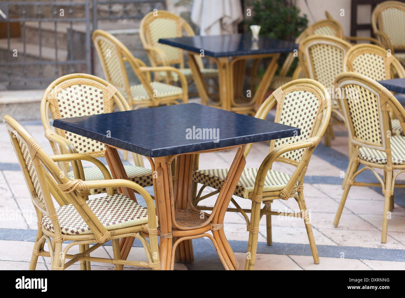 Tables and chairs outside bar Stock Photo Alamy