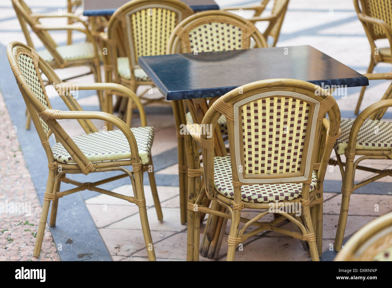 Tables and chairs outside bar Stock Photo Alamy