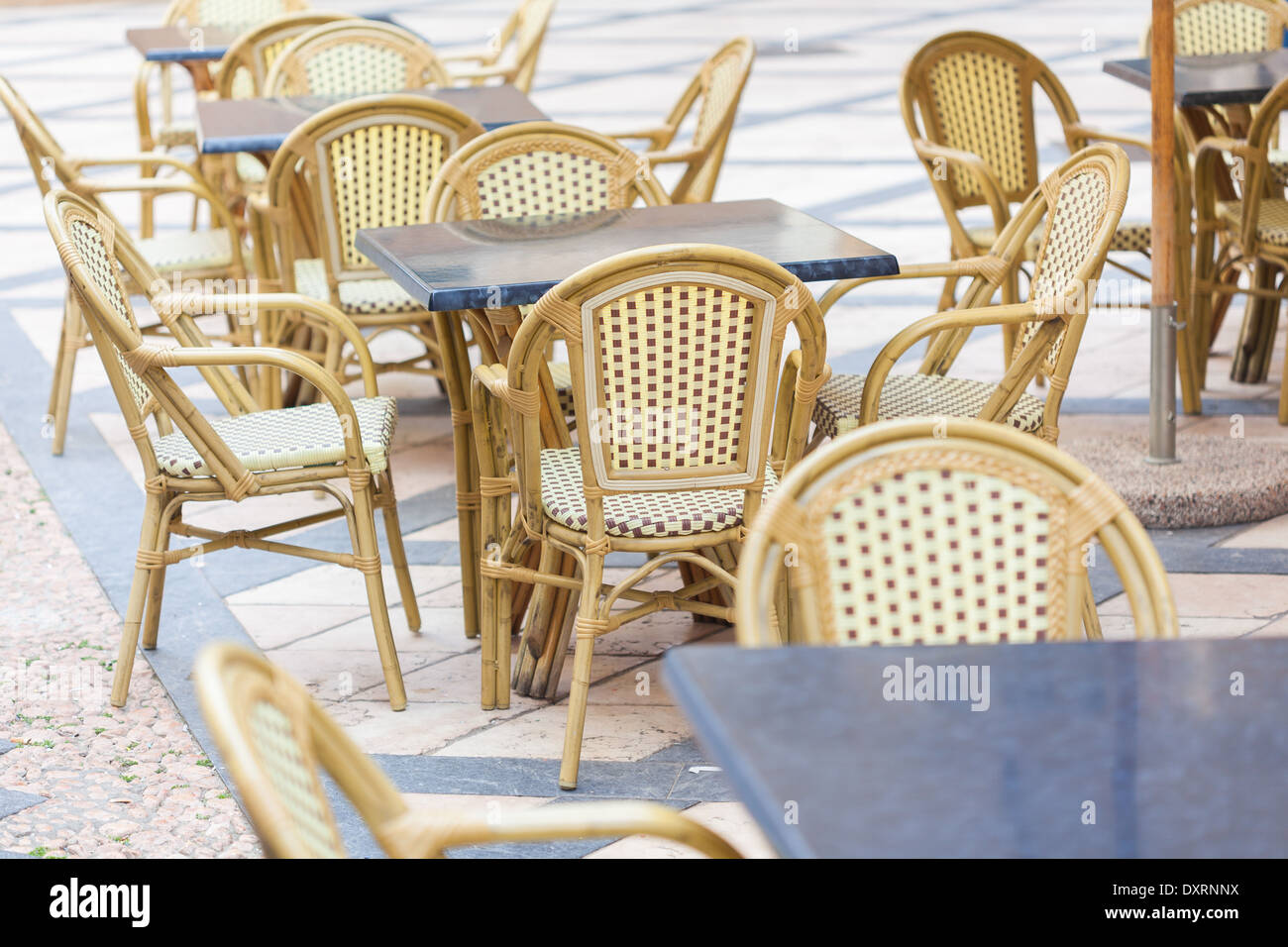 Tables and chairs outside bar Stock Photo Alamy