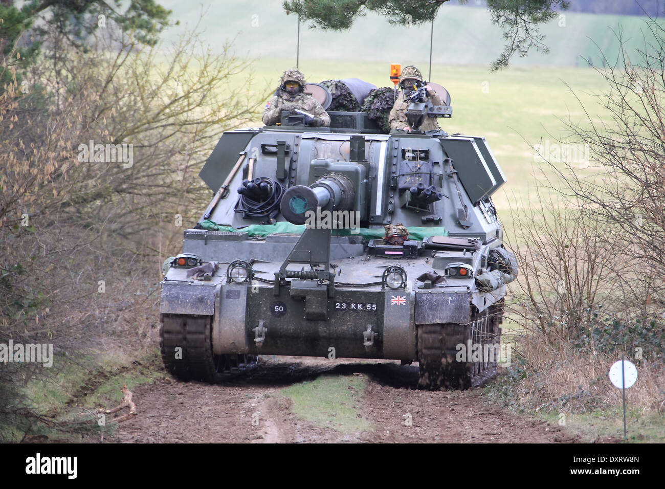 British Army AS90 TRAVELLING CROSSS COUNTRY DURING A TRAINING EXERCISE. Stock Photo