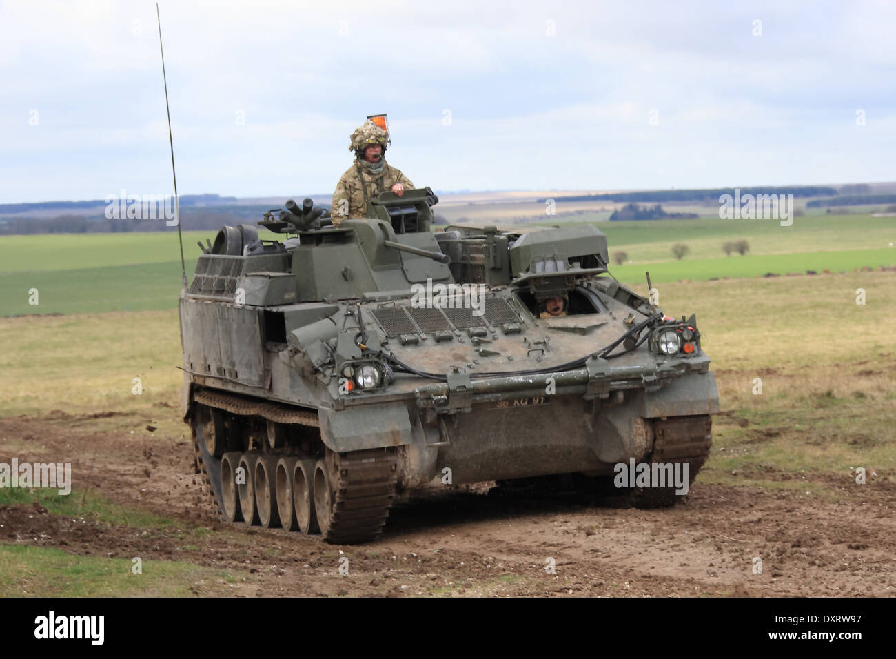 REME FV512 Mechanised Combat Repair Vehicle based the Warrior chassis travels cross country during maneuvers on Salisbury Plain Stock Photo