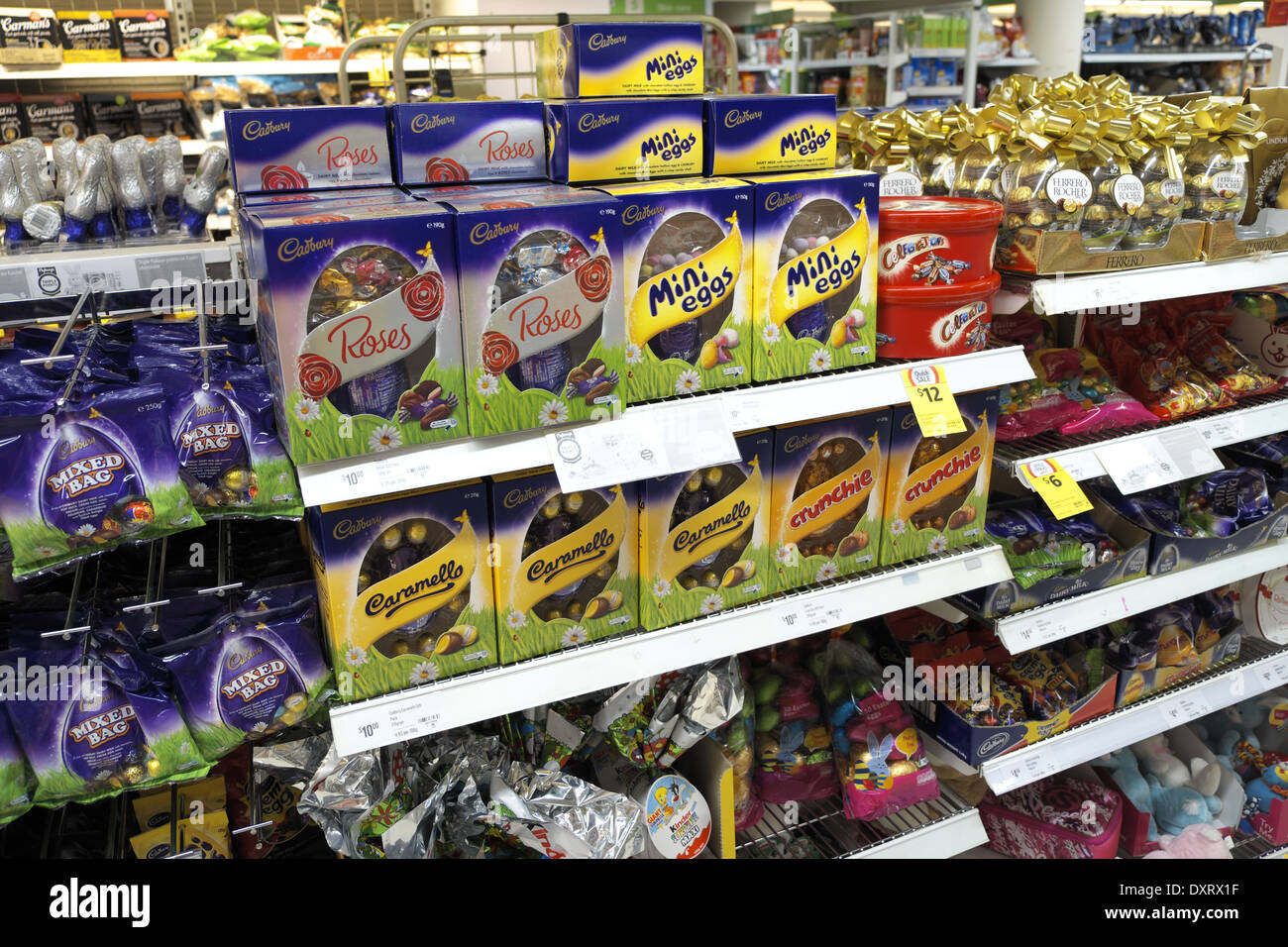 Chocolate Easter eggs and cadburys roses chocolate for sale in an australian supermarket Stock Photo