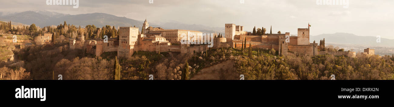 The Alhambra Palace, panoramic panorama view at sunset from Church of St Nicholas, Granada, Andalusia, Spain Stock Photo