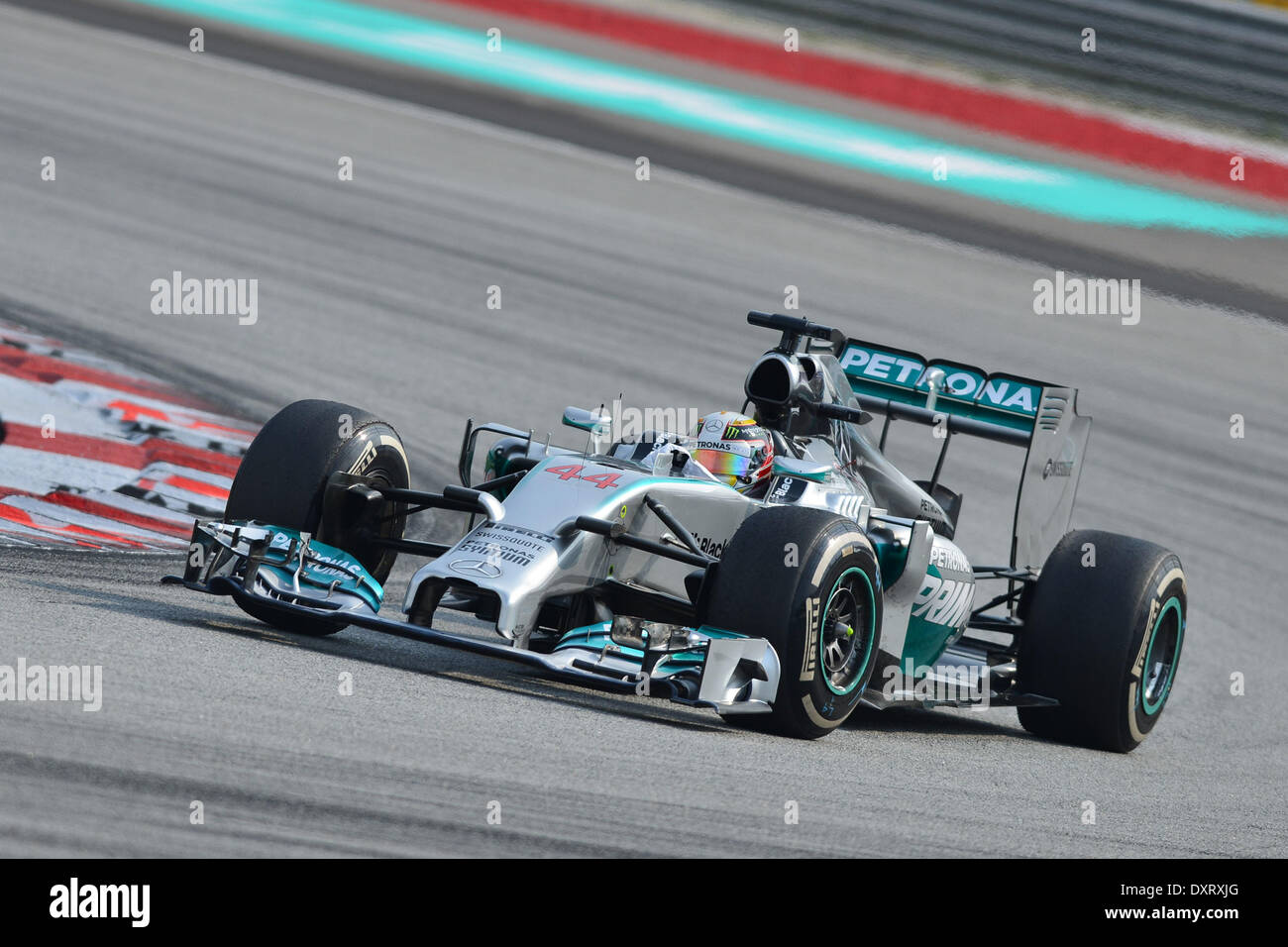 Sepang, Malaysia. 30th Mar, 2014. Mercedes GP driver Lewis Hamilton of Great Britain drives during the Malaysian Formula One Grand Prix at Sepang International Circuit in Sepang, Malaysia, March 30, 2014. Hamilton won the race. Credit:  Chong Voon Chung/Xinhua/Alamy Live News Stock Photo