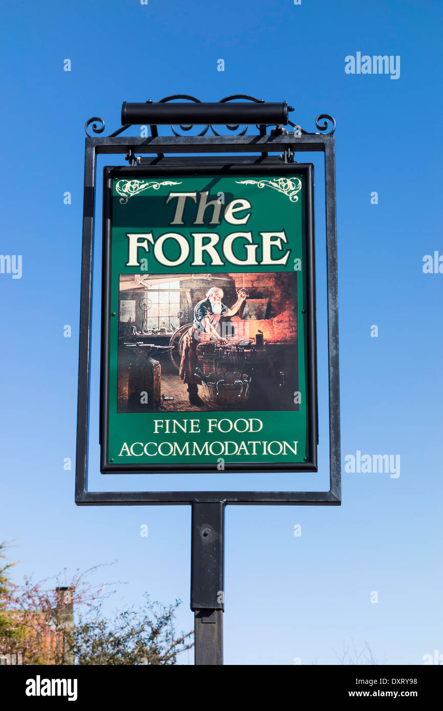 Pub sign of the THE FORGE Aislaby Whitby a small village in the North Yorkshire Moors National Park Stock Photo