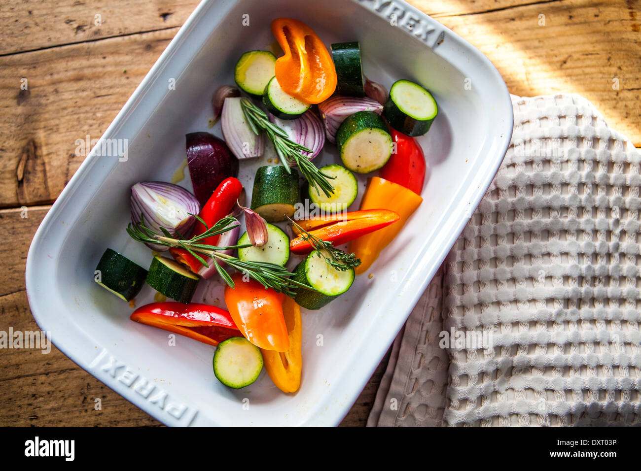 Mediterranean vegetables in a pan ready for roasting Stock Photo Alamy