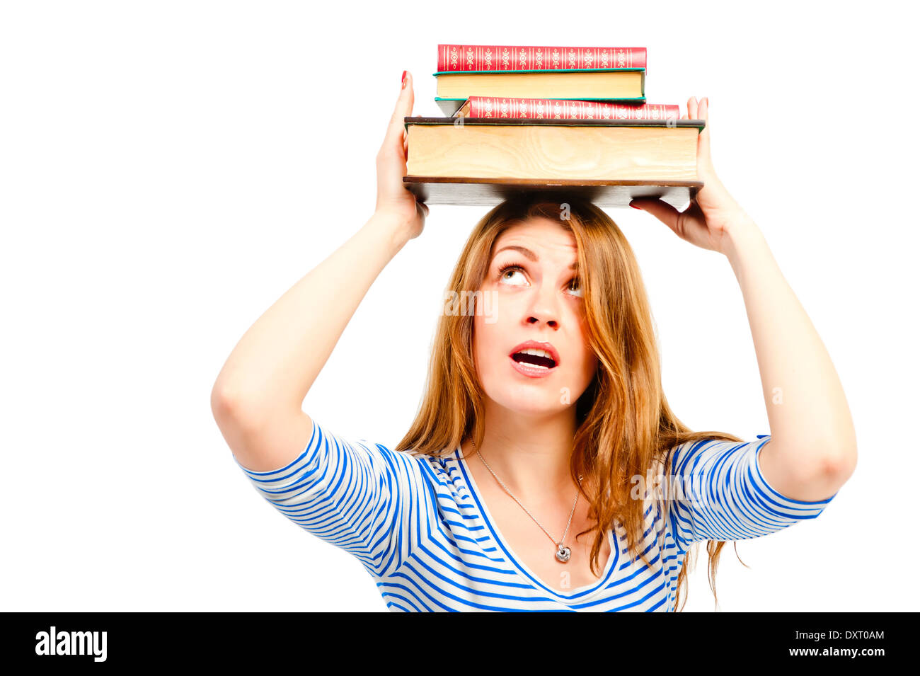 beautiful girl student with books on her head Stock Photo - Alamy