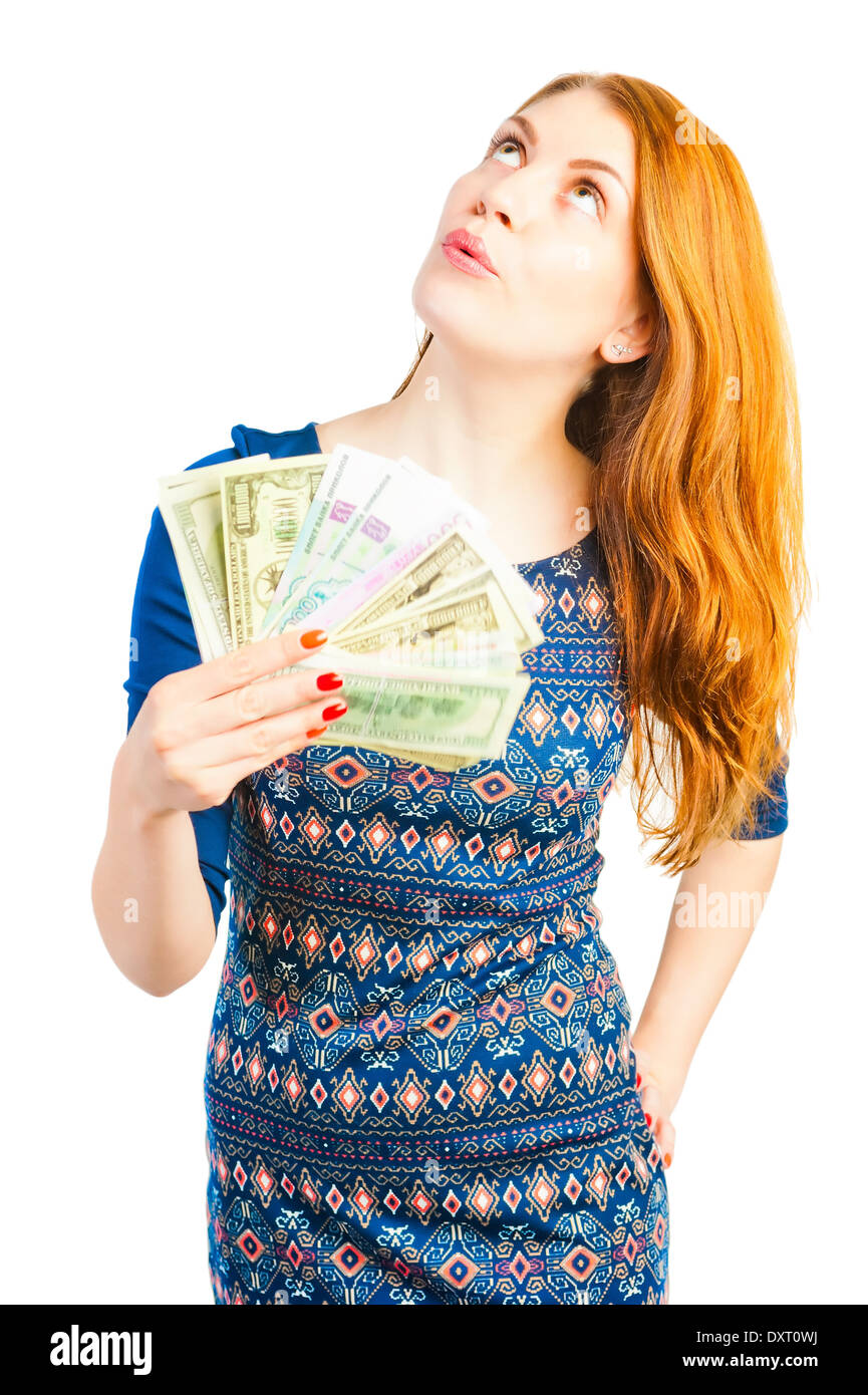 rich girl thinks to spend money Stock Photo