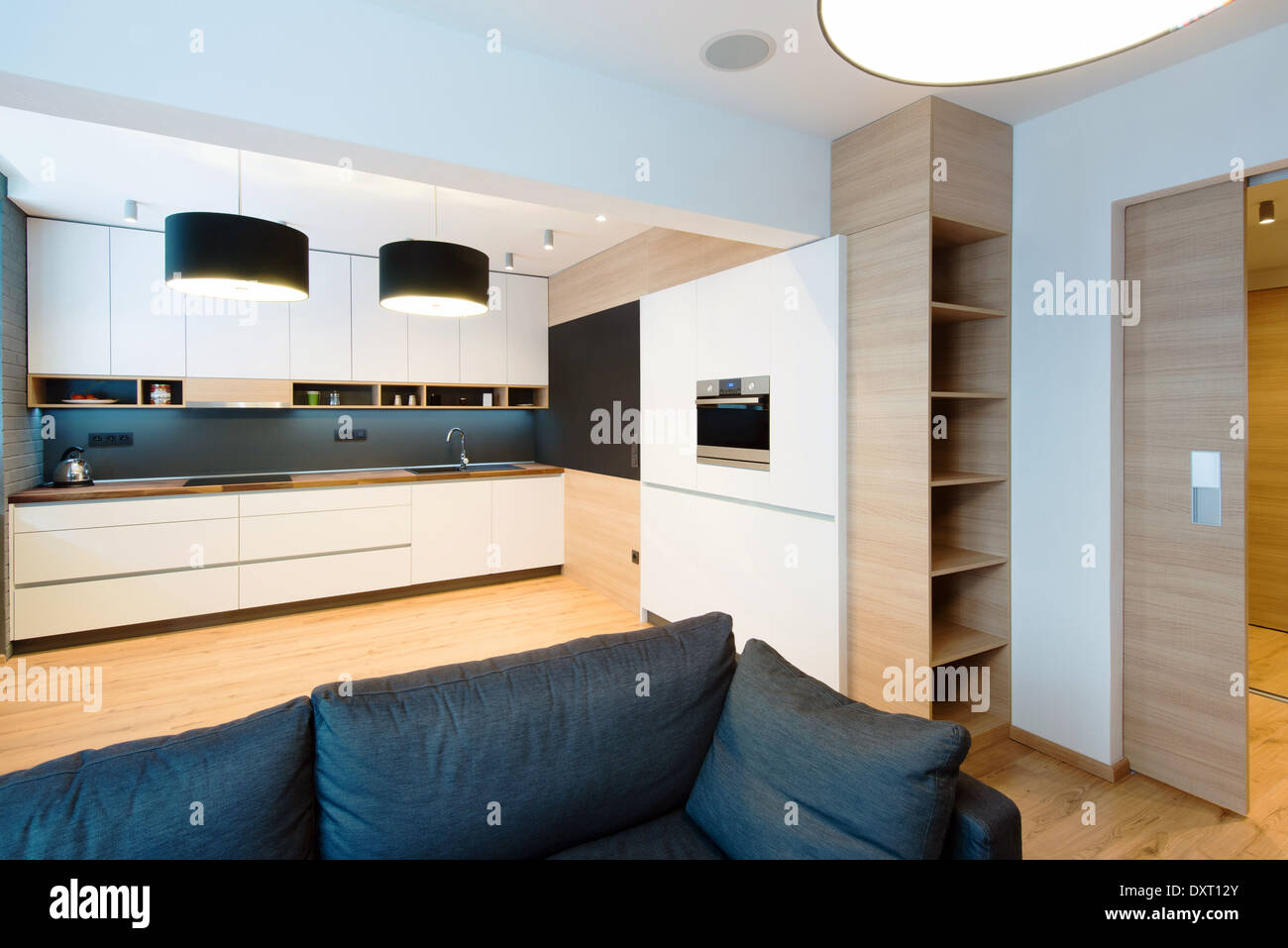 interior of modern kitchen connected with living room Stock Photo Alamy