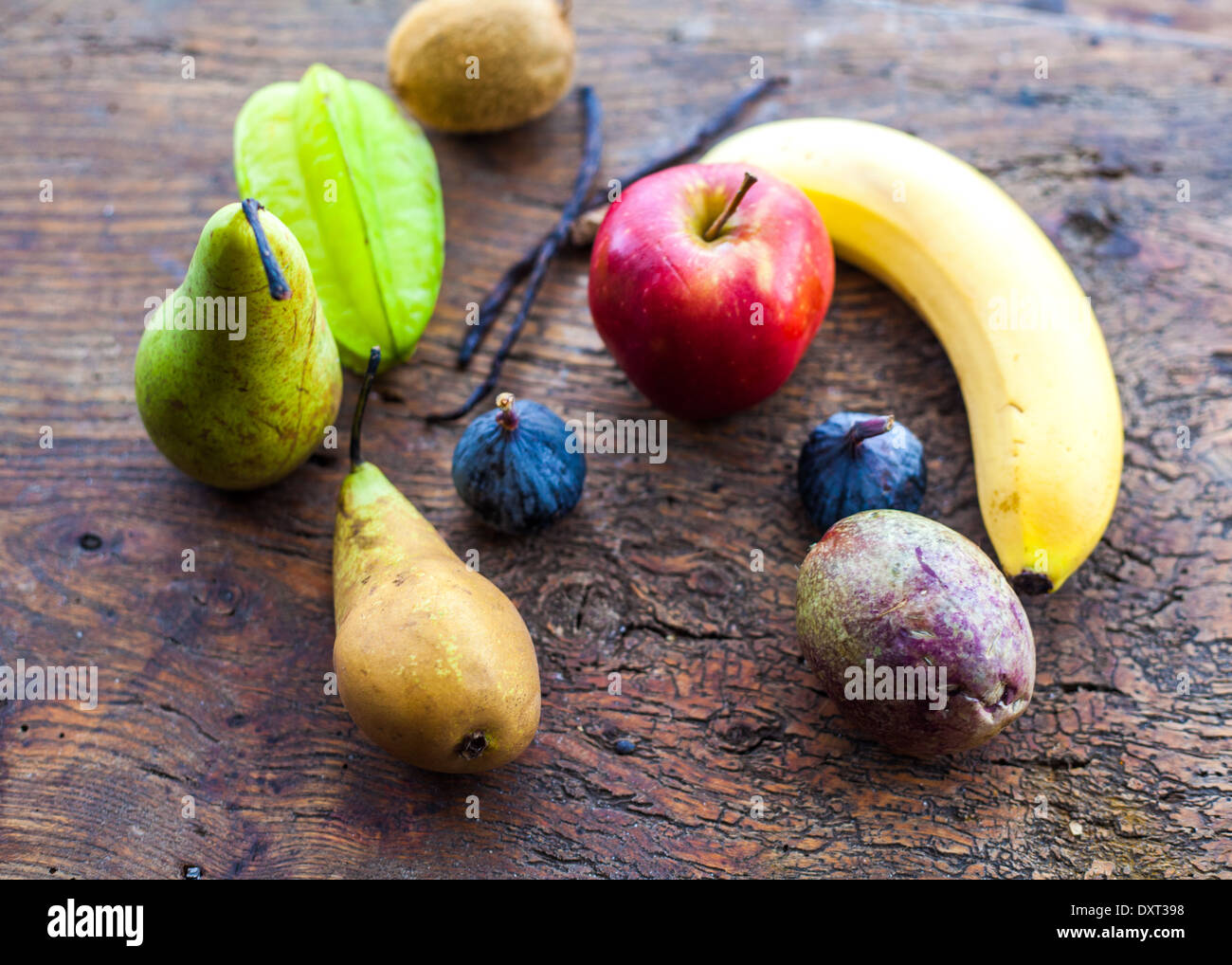 Exotic fruit on a wooden chopping board Stock Photo