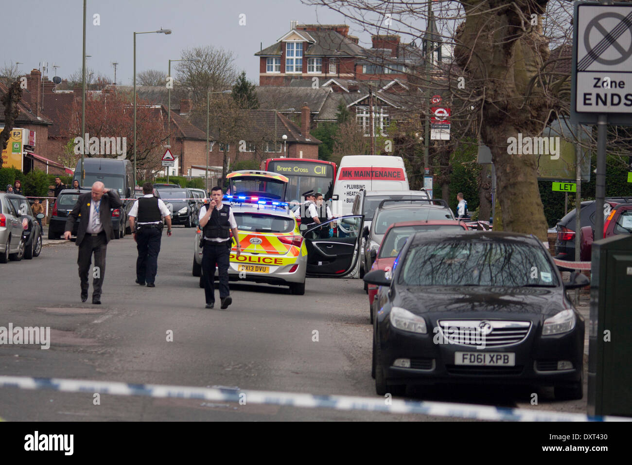 London March 30th 2014. Met police officers officers seal off