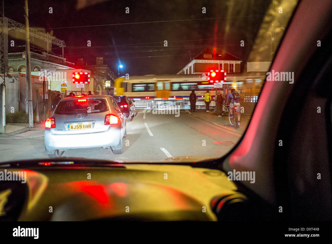 driving night danger level crossing London UK GB Stock Photo