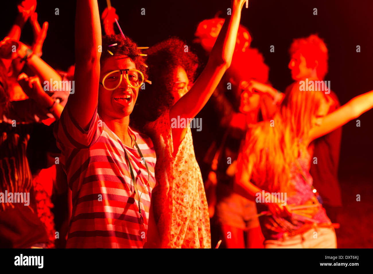 Friends dancing at music festival Stock Photo