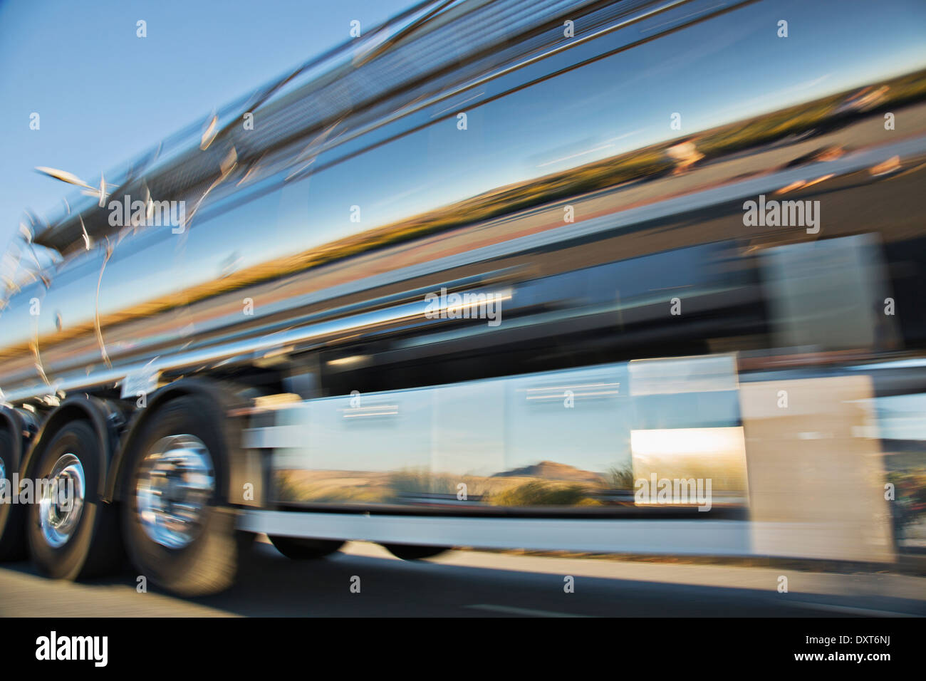 Blurred view of stainless steel milk tanker on the move Stock Photo