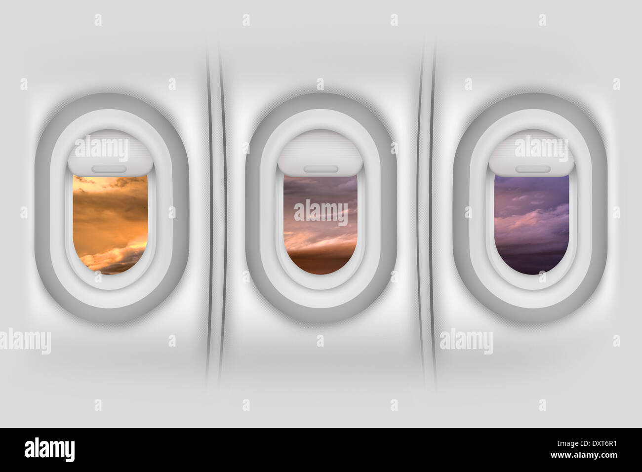 Airplane Windows / Porthole - Aircraft Side Passengers Windows From Inside. Beautiful Sunset Outside. Stock Photo