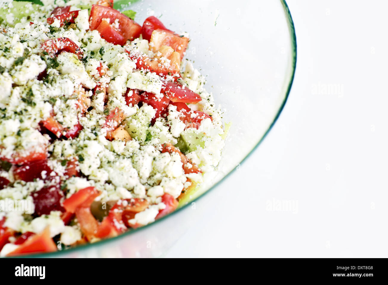 Fresh Greek Salad with Feta Cheese. Greek Salad in the Clear Glass Bowl. Diet Food Photo Collection. Stock Photo