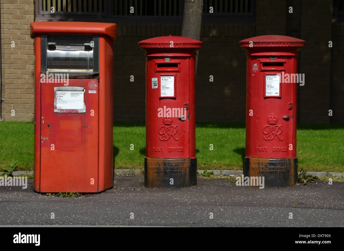 Three post boxes in the Clydebank Business Park, Clydebank, Scotland