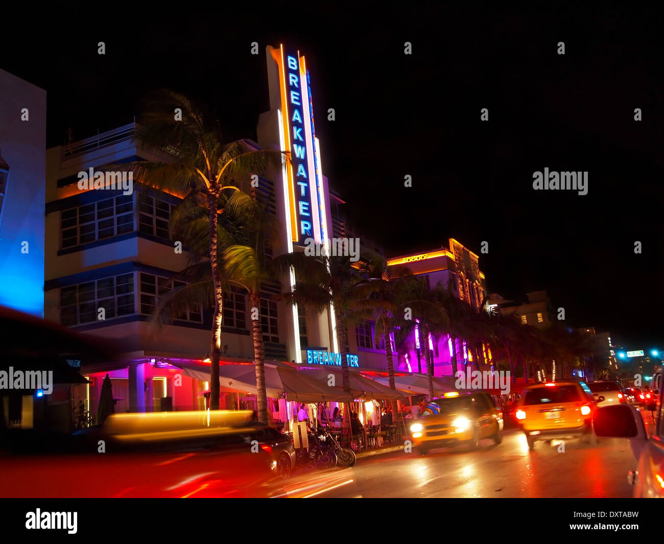 MIAMI - November 12, 2012: The Breakwater hotel on Ocean Drive in South Beach, after dark, on November 12, 2012, in Miami, Flori Stock Photo