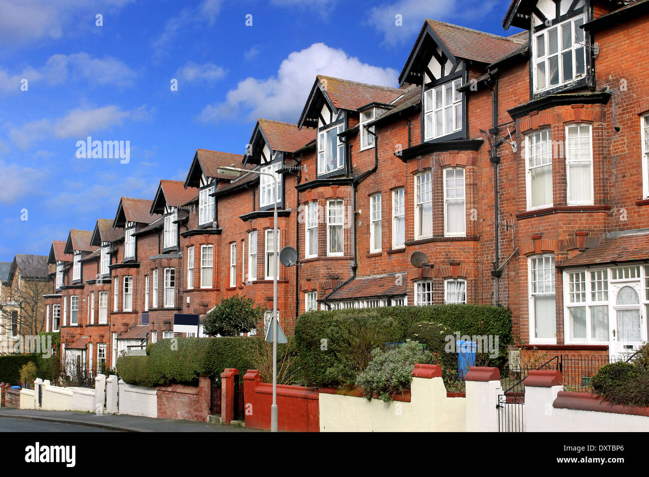 Row of old terraced houses on a street, Scarborough, England. Stock Photo