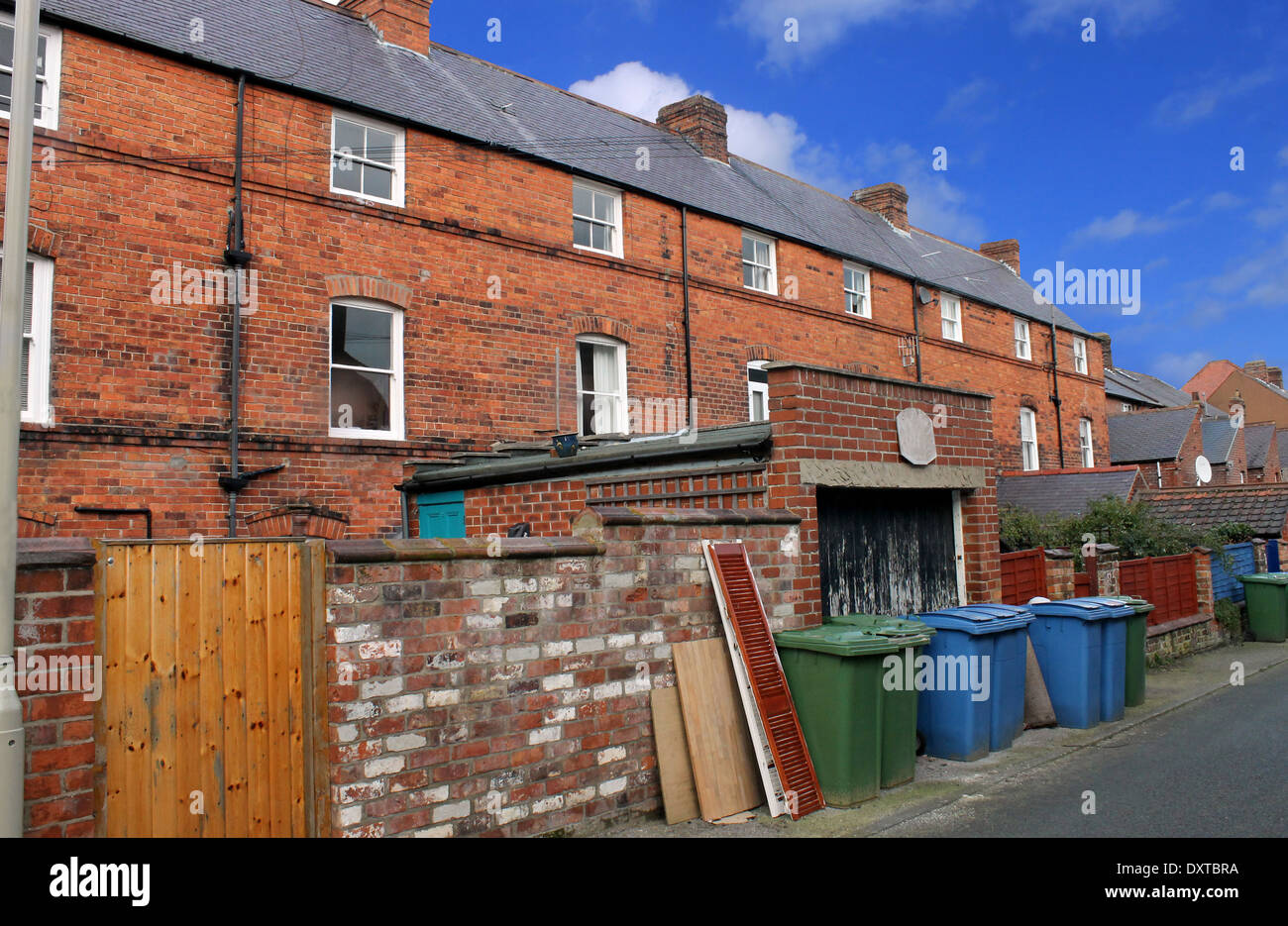 Terraced house with recycling bins in foreground Stock Photo Alamy