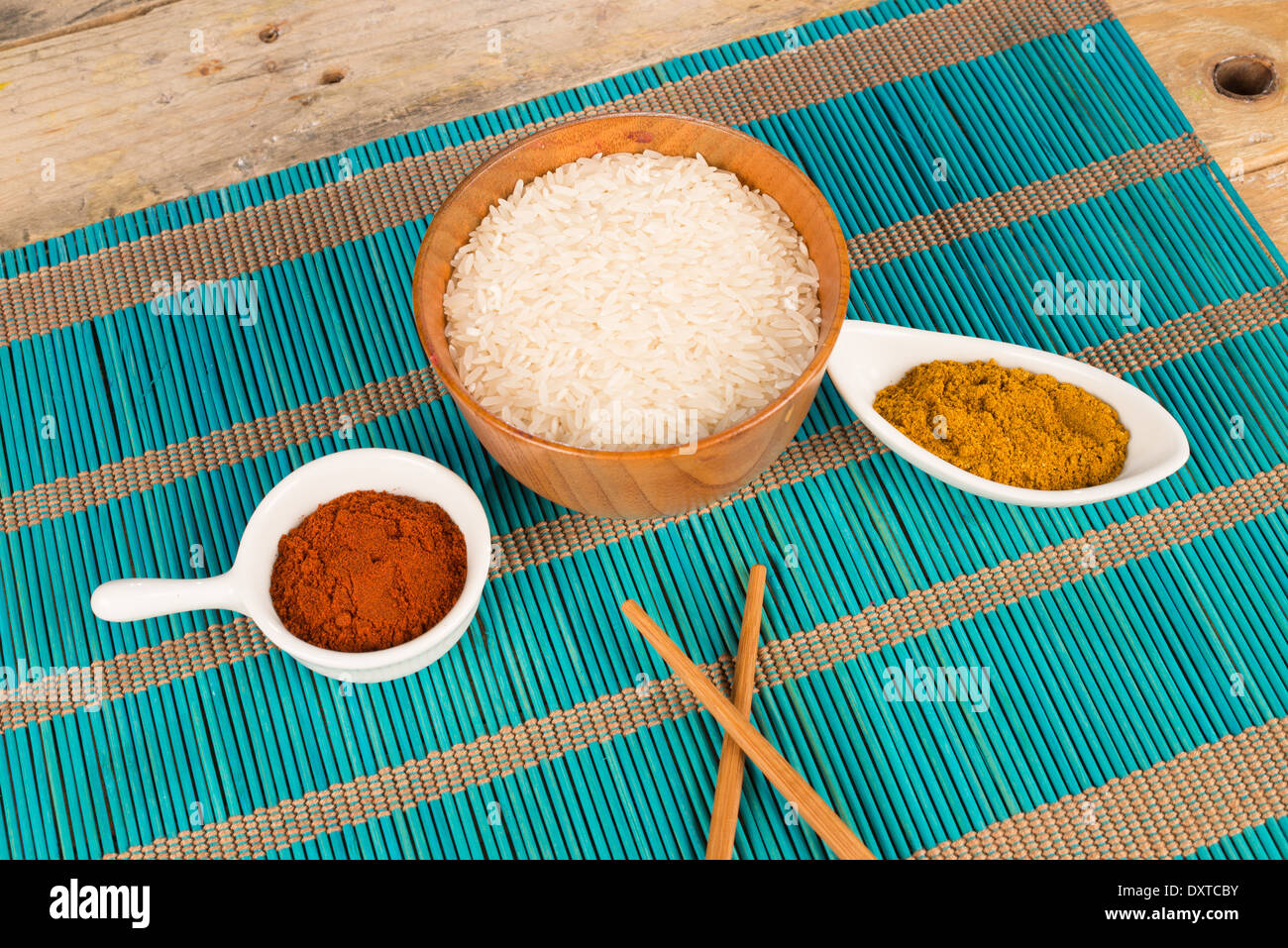 Rice and hot spices, Asian food staples Stock Photo - Alamy