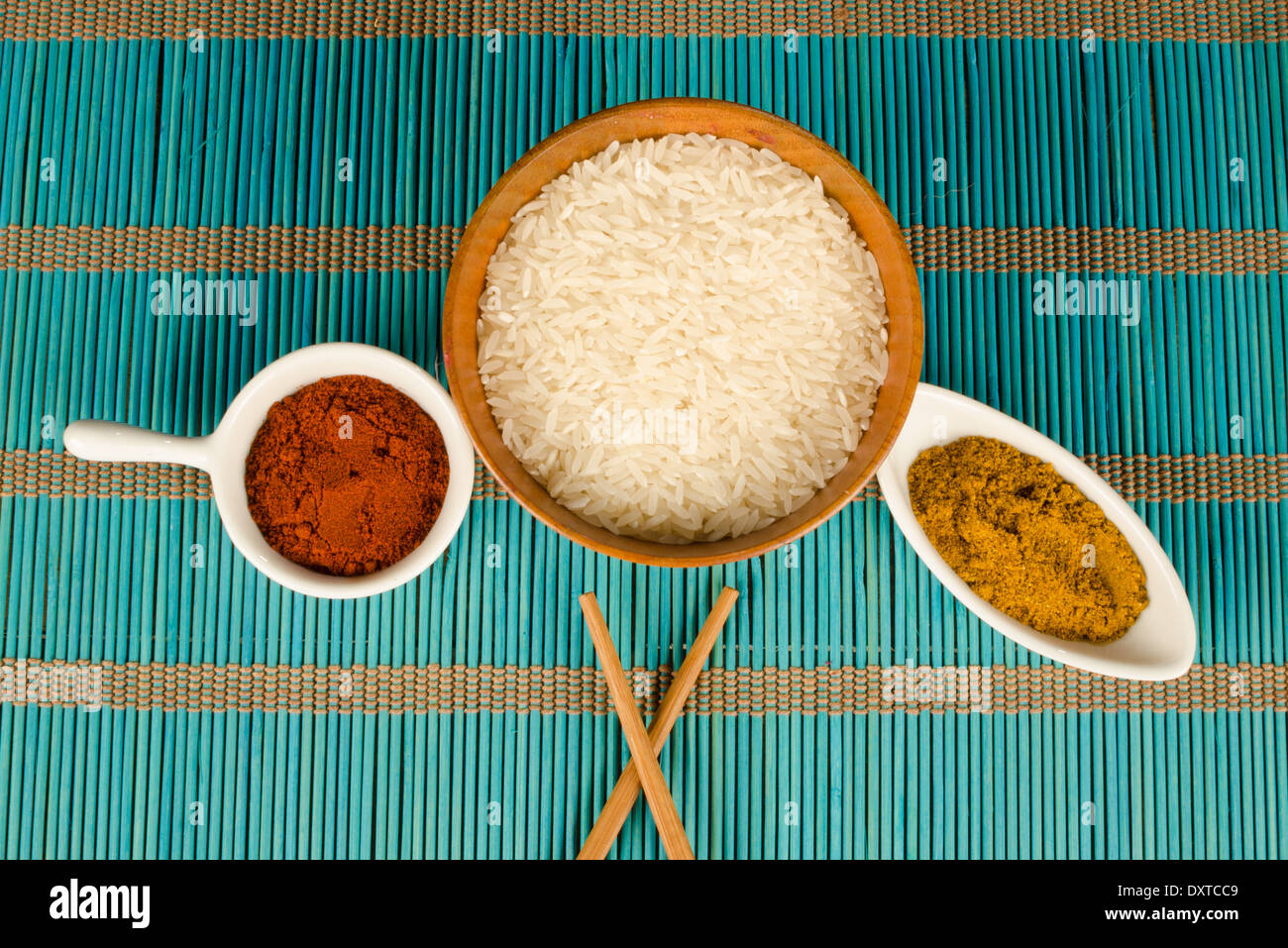 Rice and hot spices, Asian food staples Stock Photo Alamy