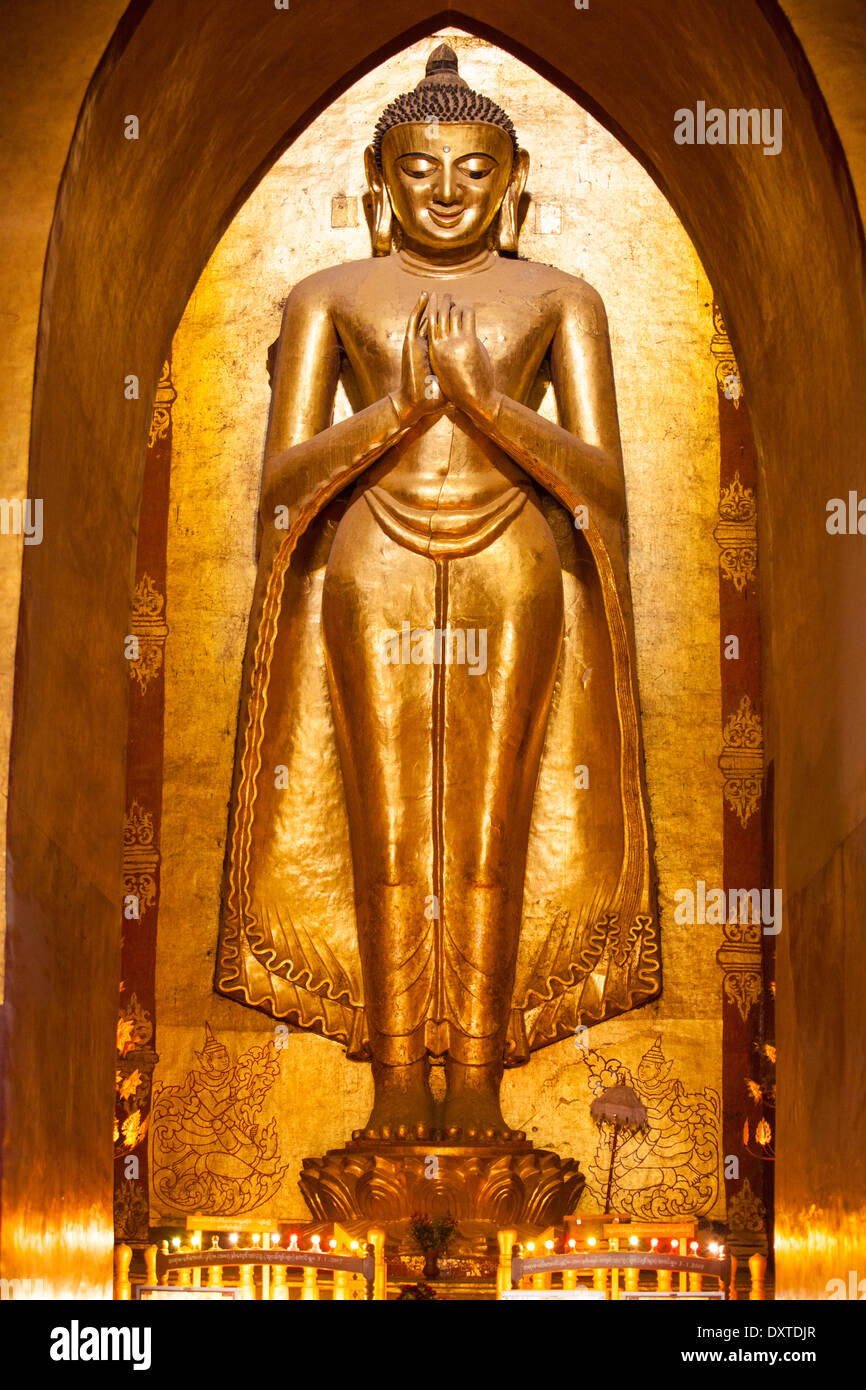 Huge golden Buddha, Ananda Pahto Buddhist Temple, Bagan Myanmar Stock Photo