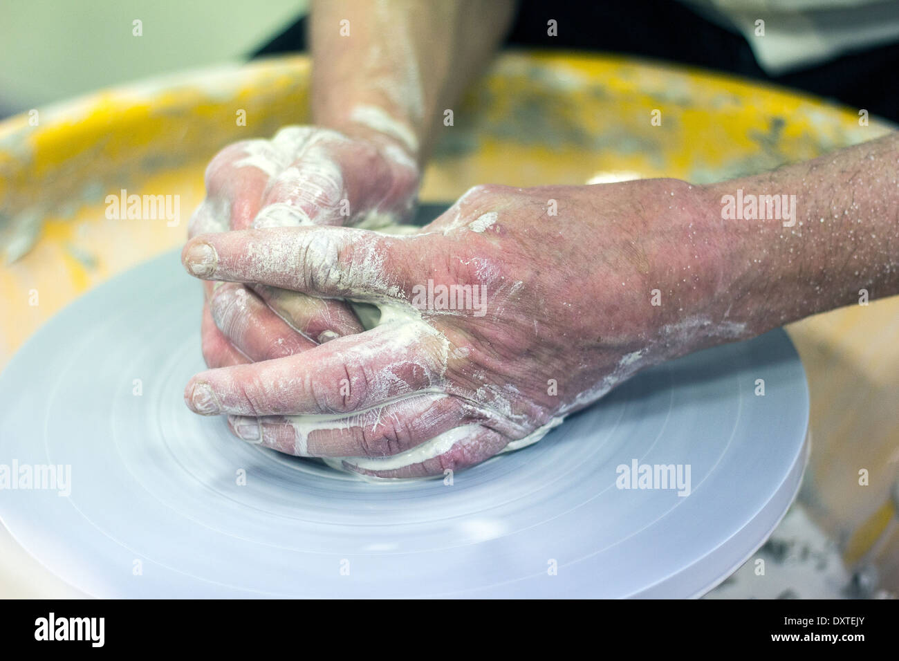 ceramics,potter,pottery,throwing, Centering the clay is one of the most important steps in