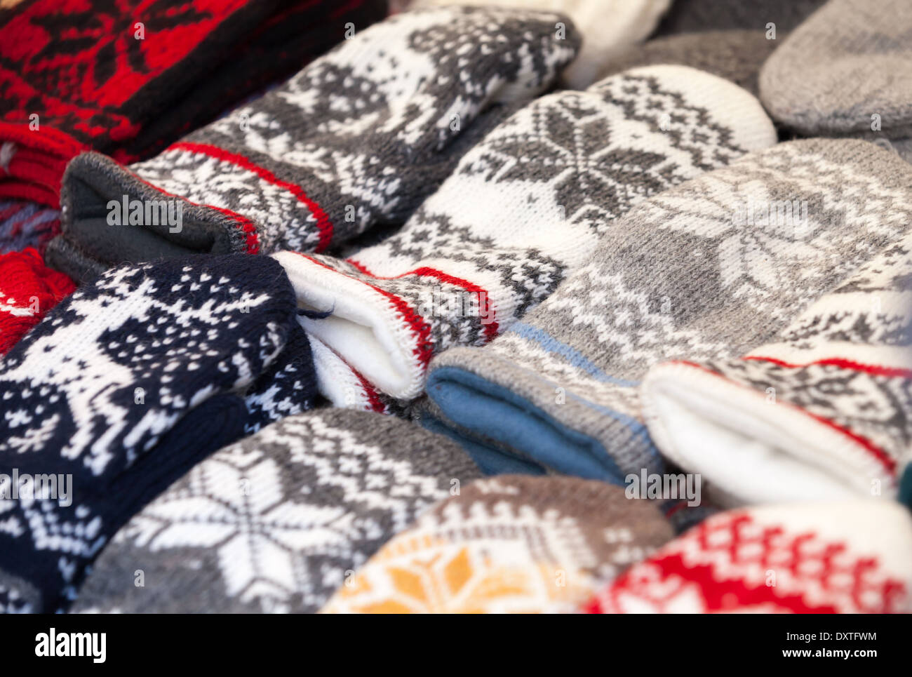 TALLINN, ESTONIA - MAY 2013: Colorful woolen mittens lie on the street counter on May 3, 2013 Stock Photo