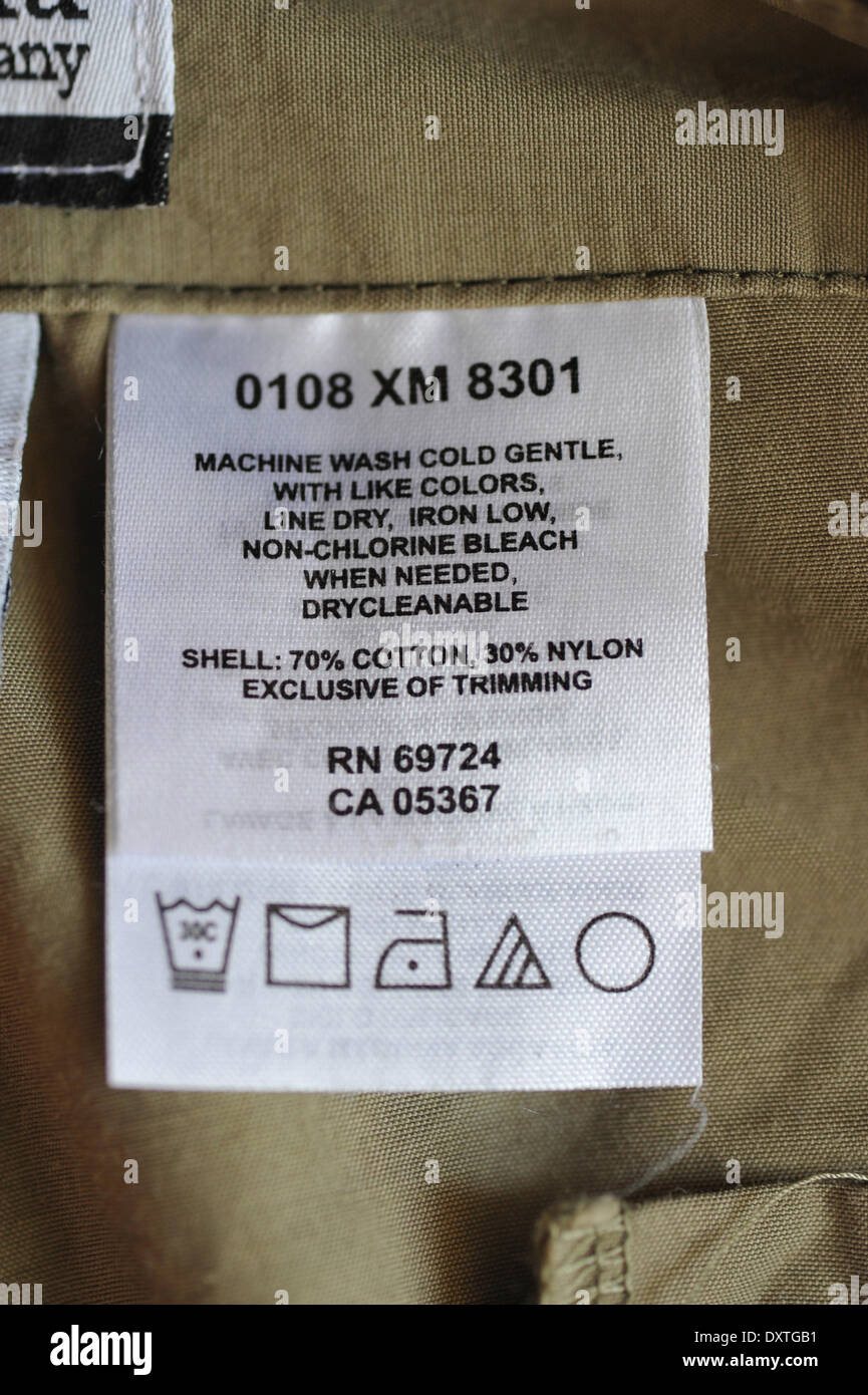 Label with wash and care instructions on a piece of clothing Stock Photo