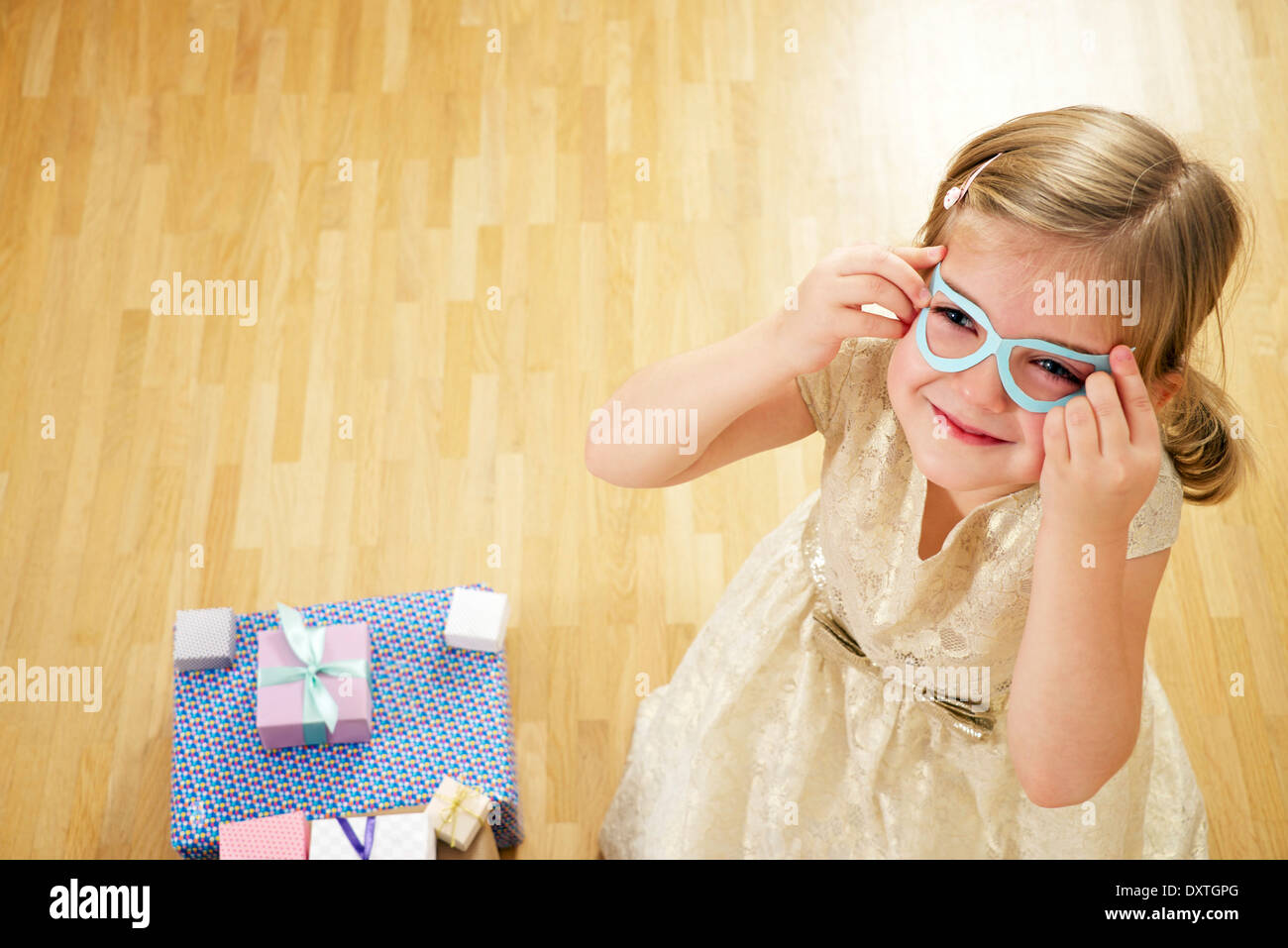Birthday girl wearing glasses, Munich, Bavaria, Germany Stock Photo