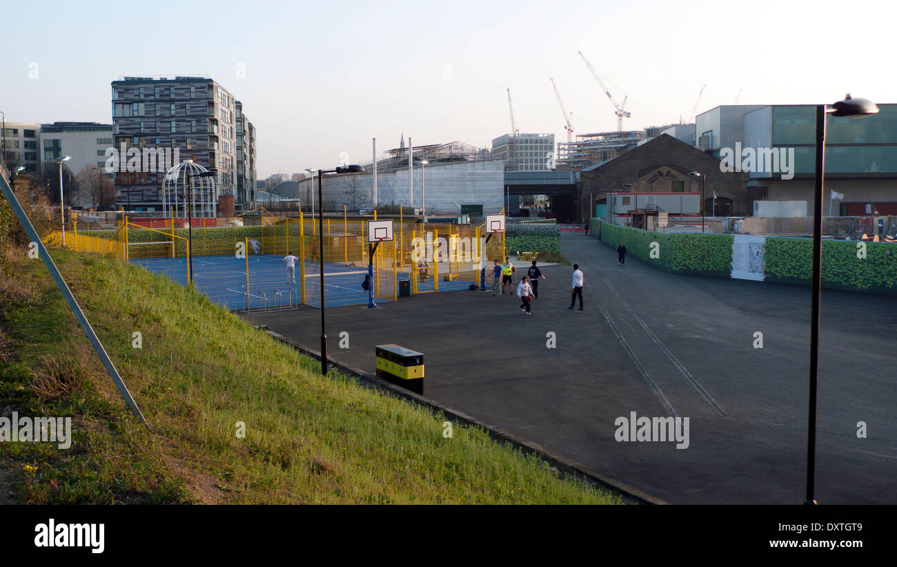 Children playing in playground after school at Kings Cross London N1