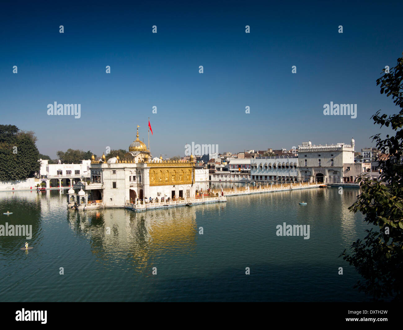 India, Punjab, Amritsar, Gole Bagh, Shree Durgiana Tirth Mandir Lakshmi Narayan Hindu Temple surrounded by pool Stock Photo