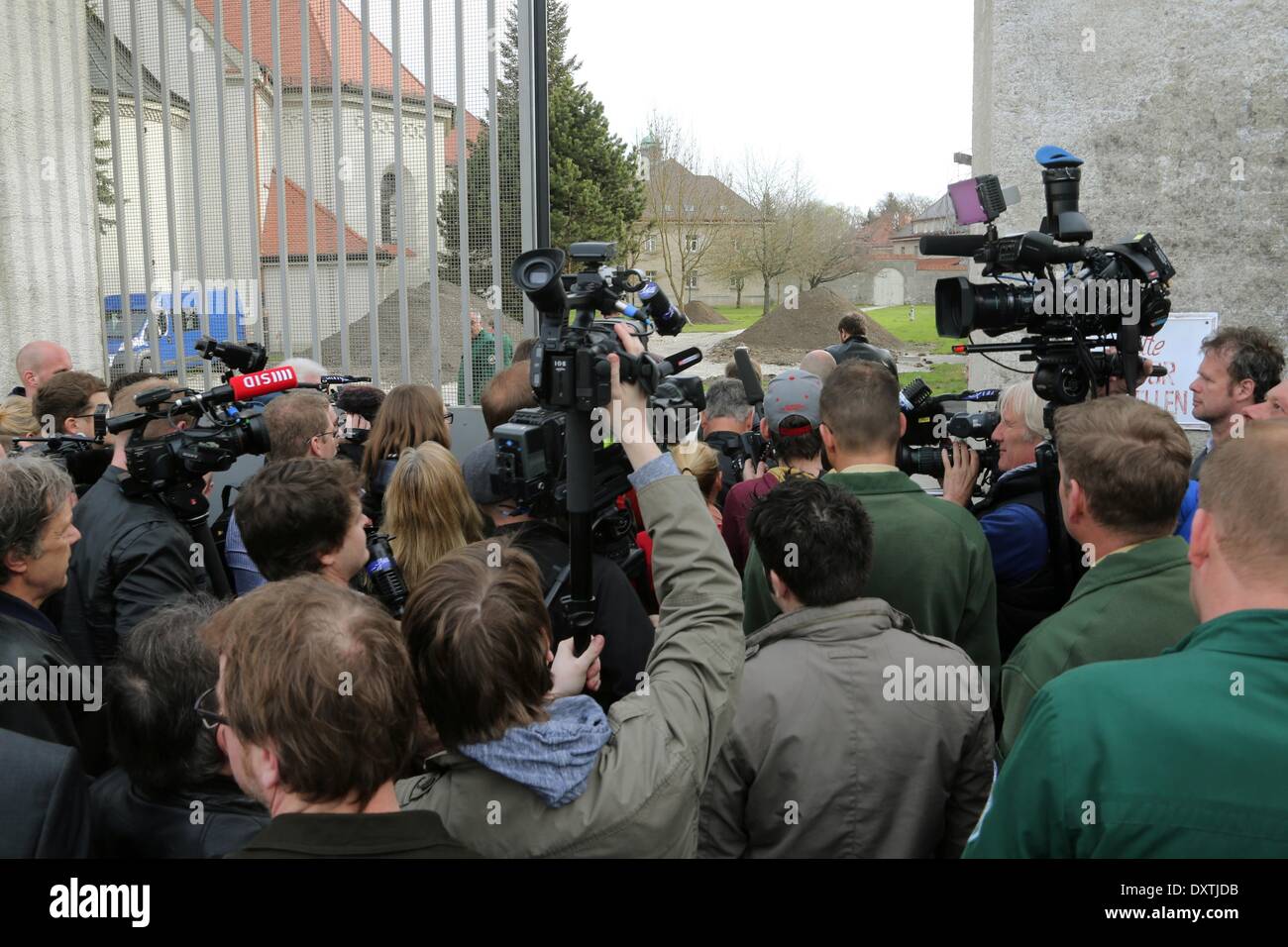 Landsberg, Germany. 31st Mar, 2014. Journalists wait at the entrance of the Landsberg detention center in Landsberg, Germany, 31 March 2014. Here, former president of German football club Bayern Munich Uli Hoeness, who was sentenced to three and a half years in prison for tax evasion, will begin his term in a few weeks. Photo: Stephan Jansen/dpa/Alamy Live News Stock Photo