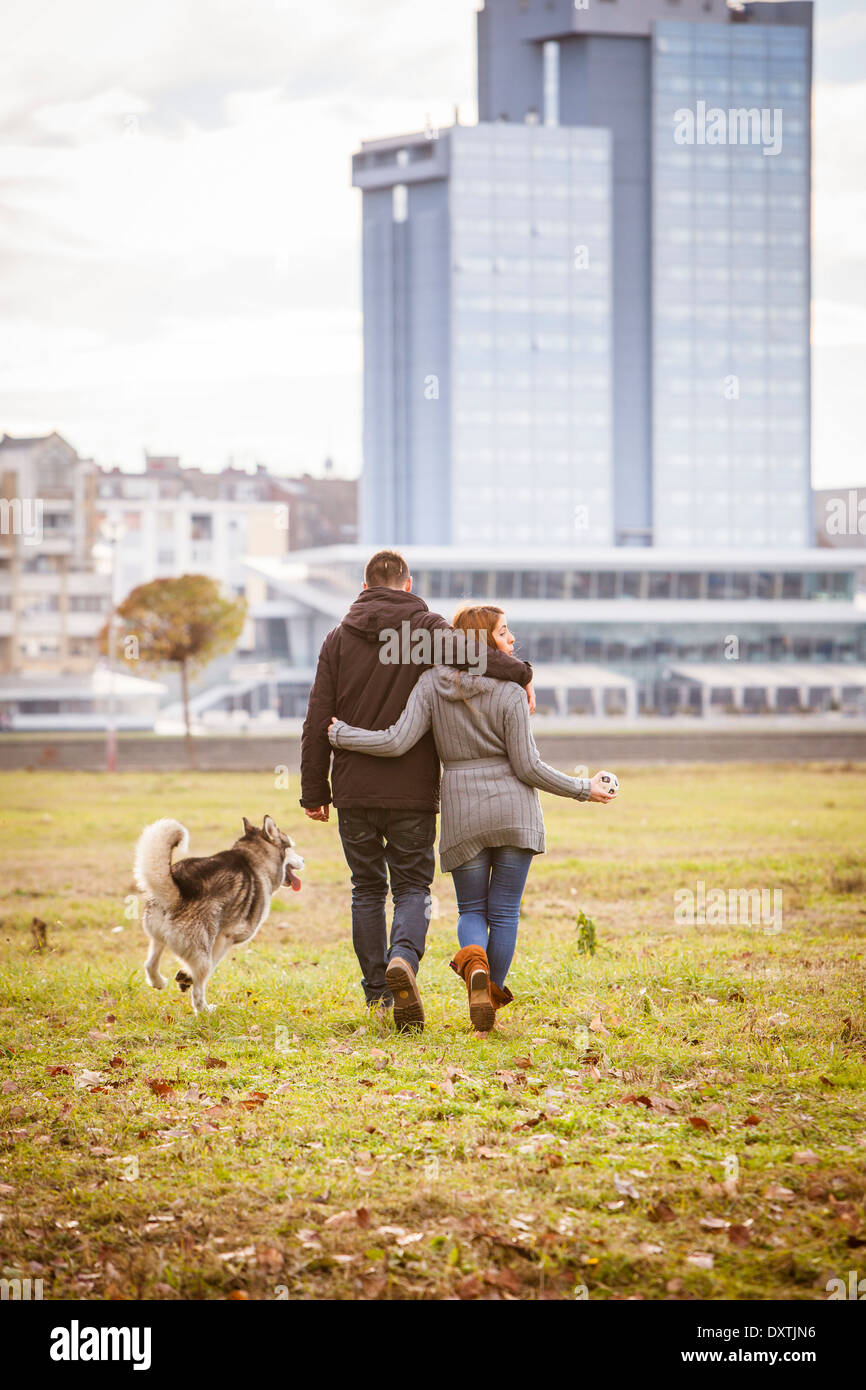 Two young women walking dog hi-res stock photography and images - Alamy