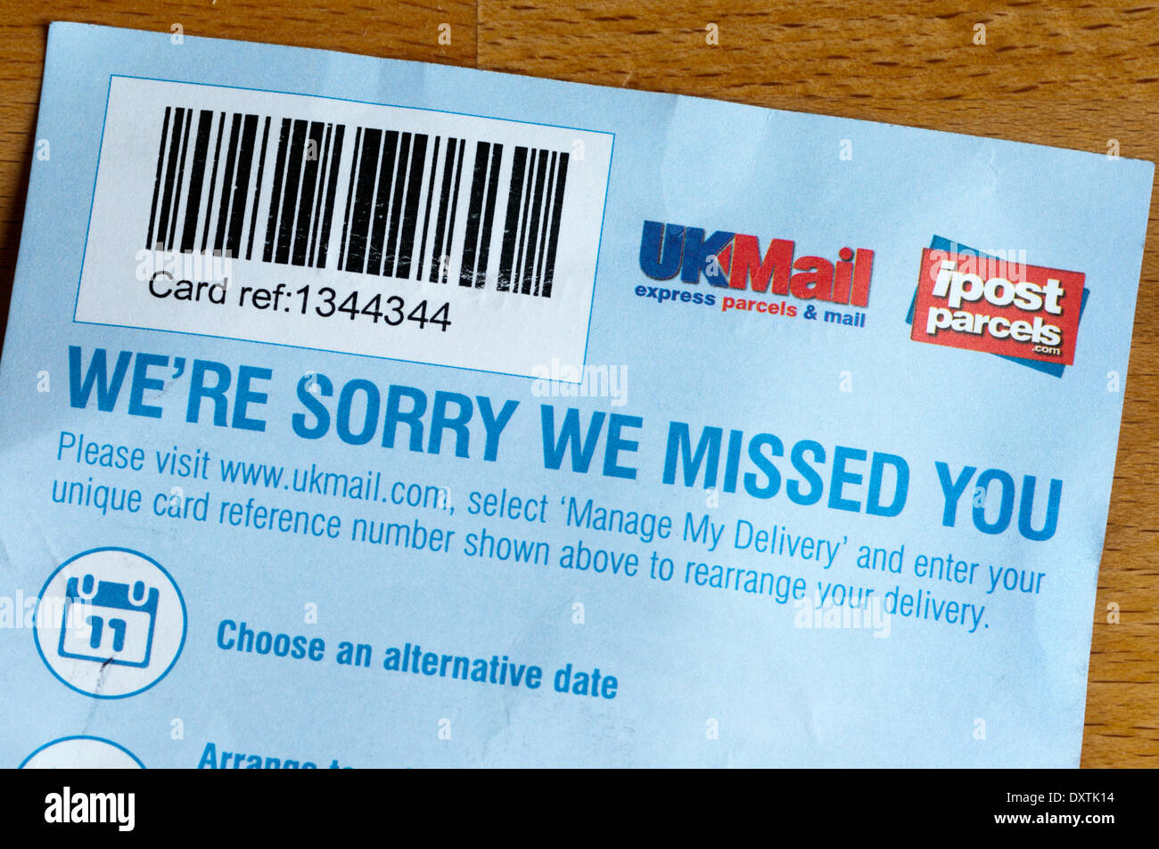 Note left by delivery company or courier unable to deliver parcel. Stock Photo