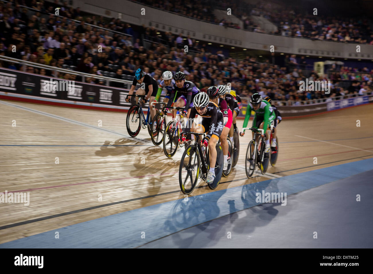 Cyclists race around the track at the London Olympic Velodrome Stock Photo